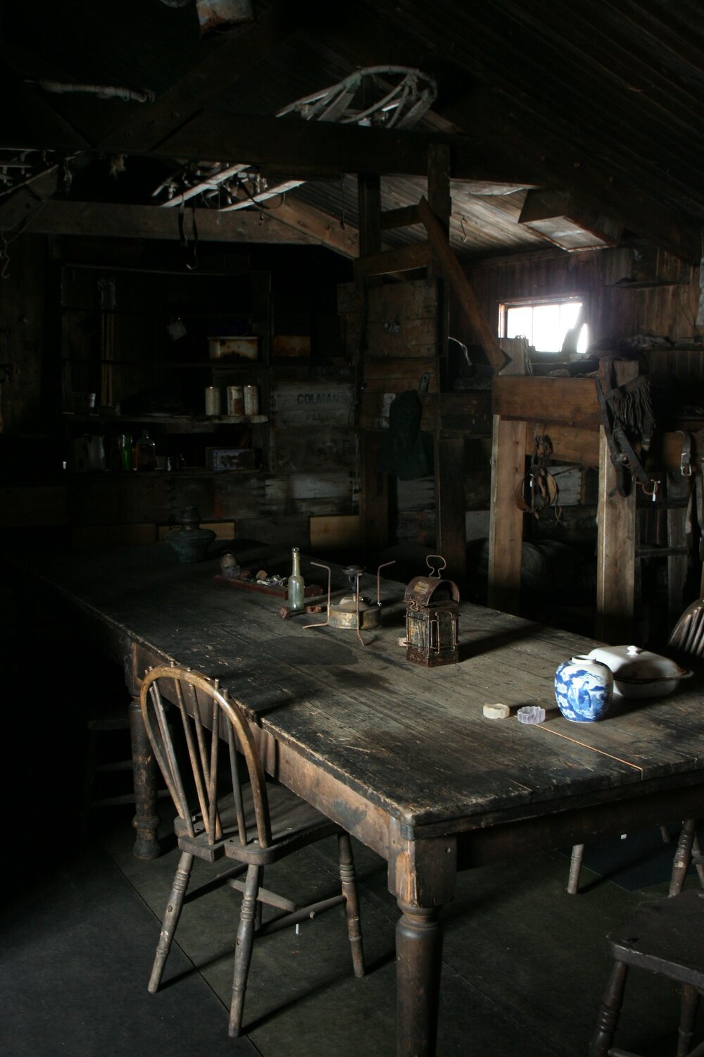 2010-11 Artefacts on the Wardroom table inside Scott's 'Terra Nova' hut