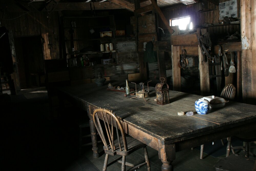 2010-11 Artefacts on the Wardroom table inside Scott's 'Terra Nova' hut