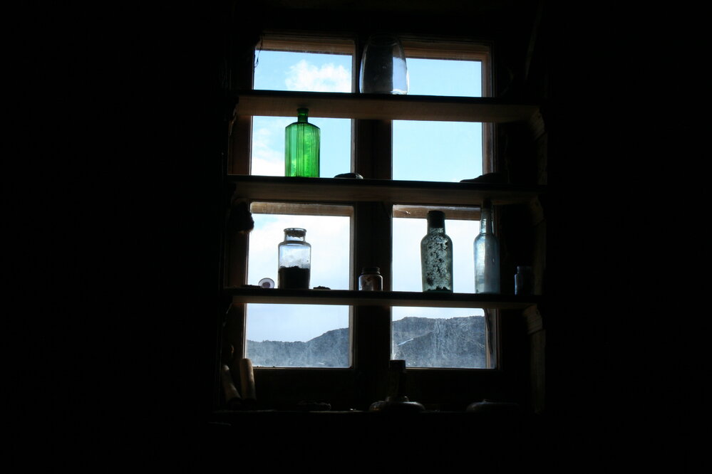 2010-11 Bottles in a window of Shackleton's 'Nimrod' hut, Cape Royds