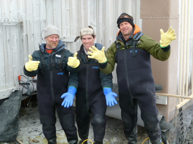 2010-11 Al Fastier, Jamie Clarke, and John Taylor preparing to go underneath the hut