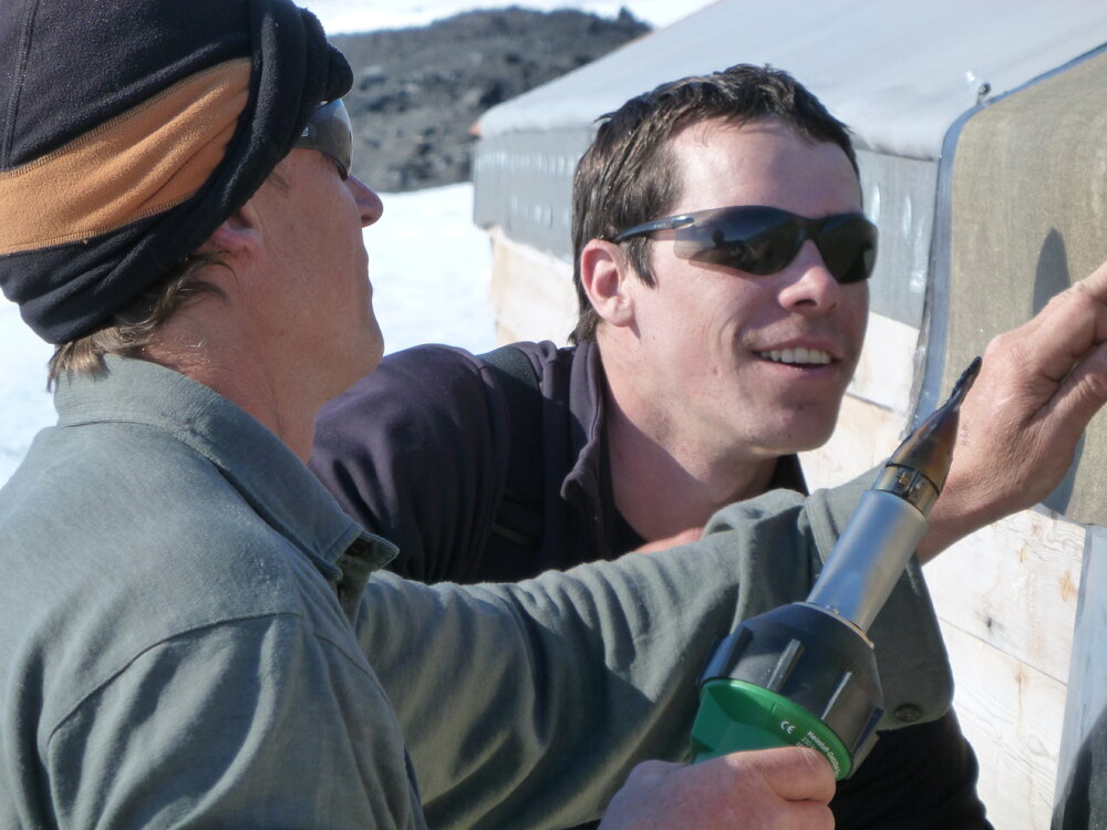 2010-11 John Taylor and Jamie Clarke installing roof material, Cape Evans
