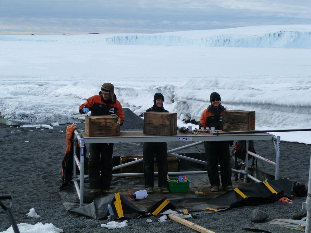 2010-11 AHT Staff treating bulkhead boxes, Cape Evans