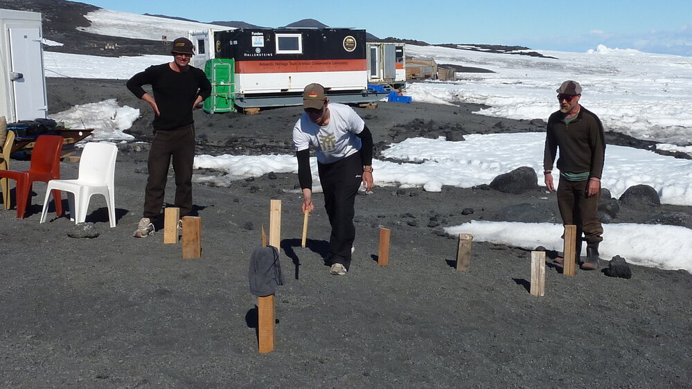 2010-11 AHT Team playing Kubb on Christmas Day, Cape Evans (002)