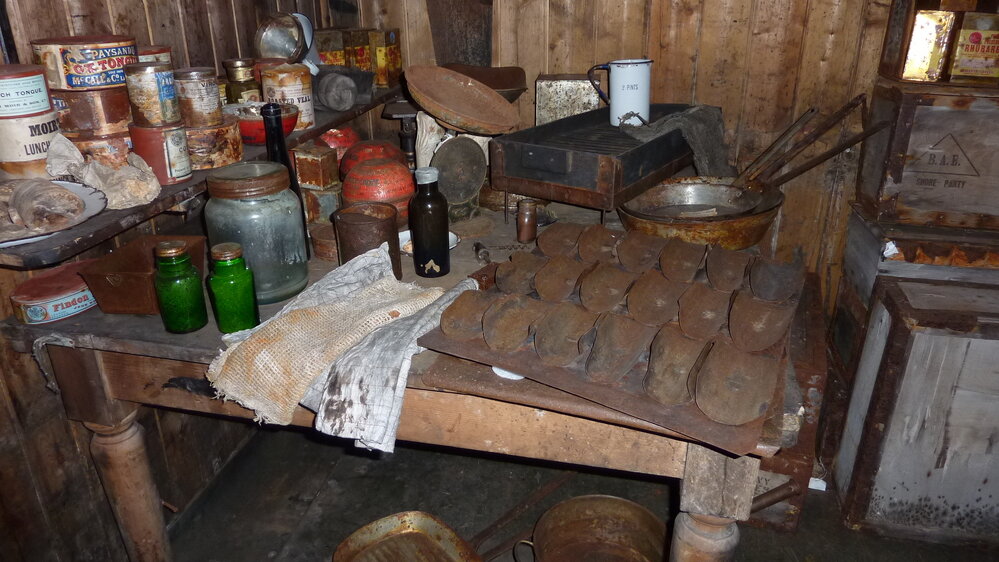 2010-11 Bread pans on a table in the Galley inside Scott's 'Terra Nova' hut