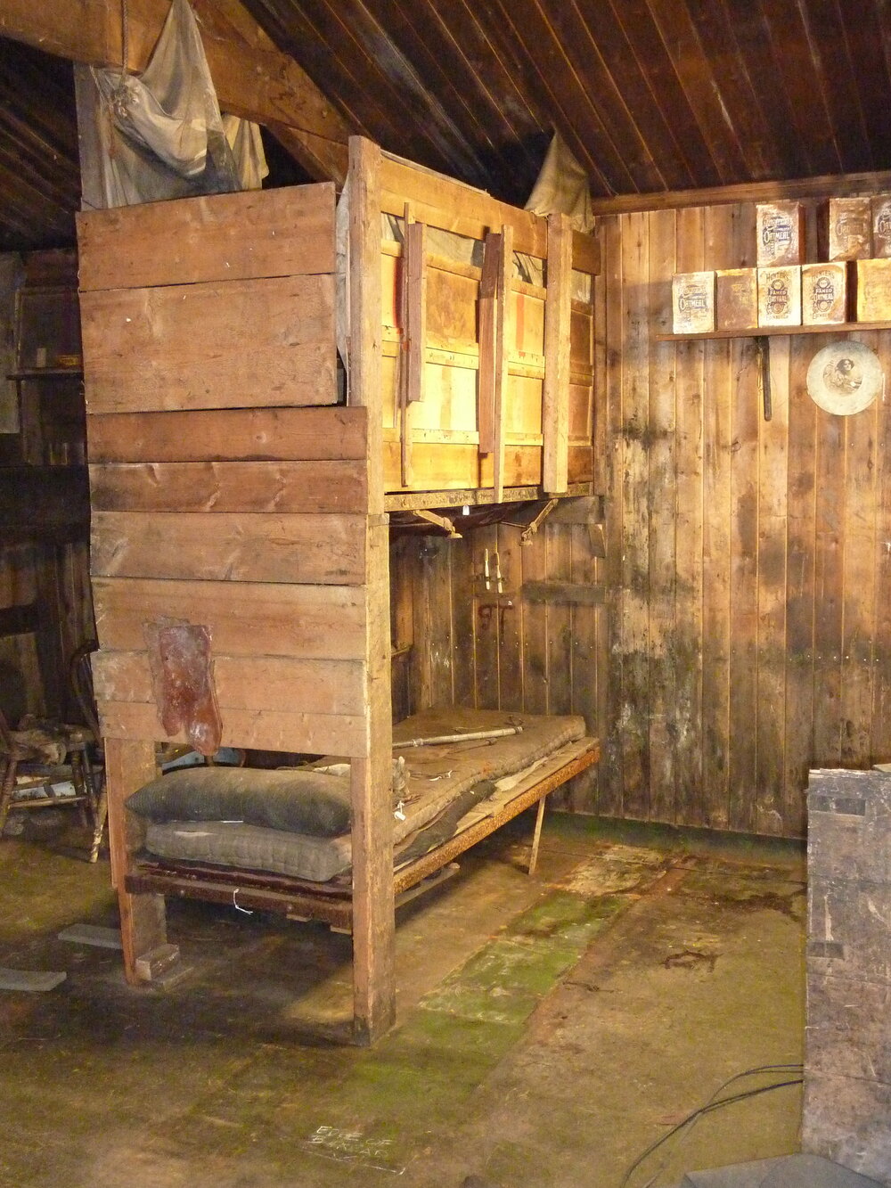 2010-11 Bulkhead removed showing Gran and Taylor's bunks, Cape Evans