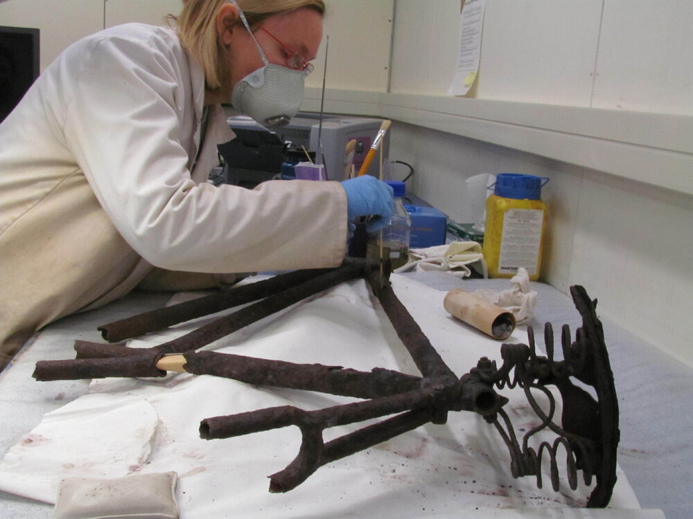 AHT Conservator Julie Unruh treating bicycle frame