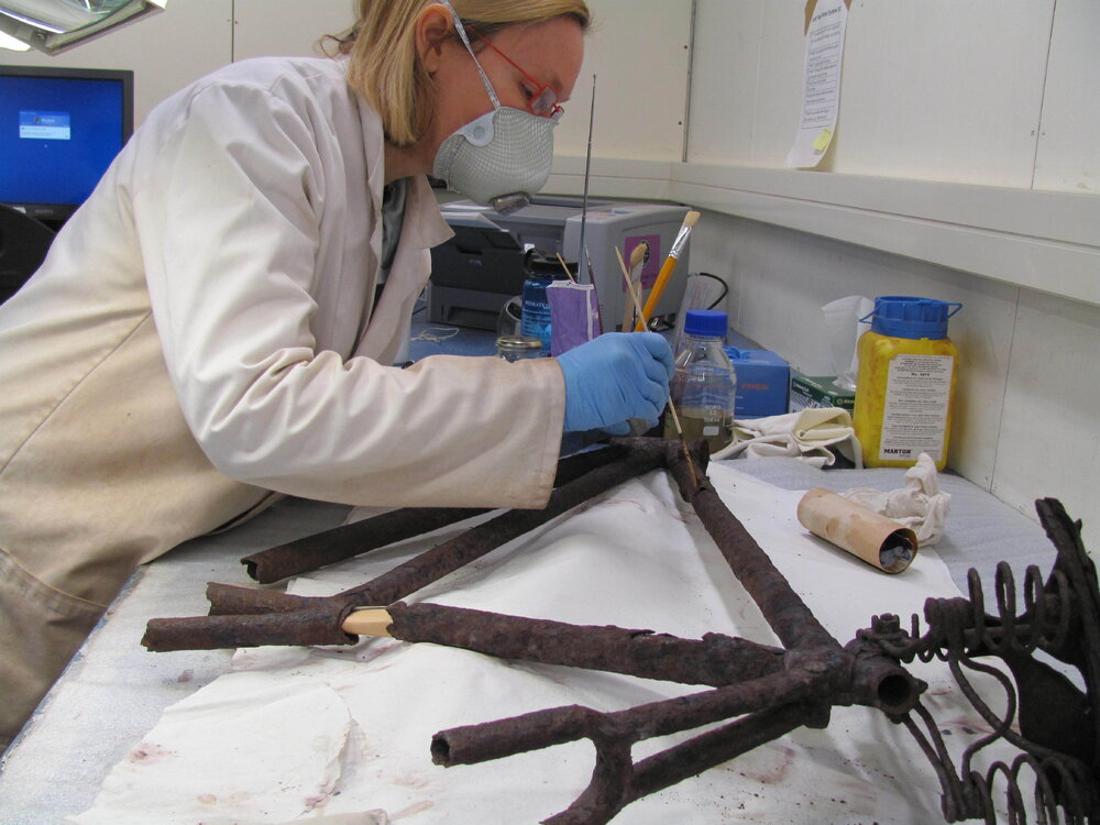 AHT Conservator Julie Unruh treating bicycle frame (001)