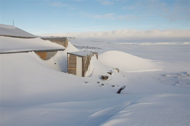 Snow build-up, north and latrine of Scott's 'Terra Nova' hut