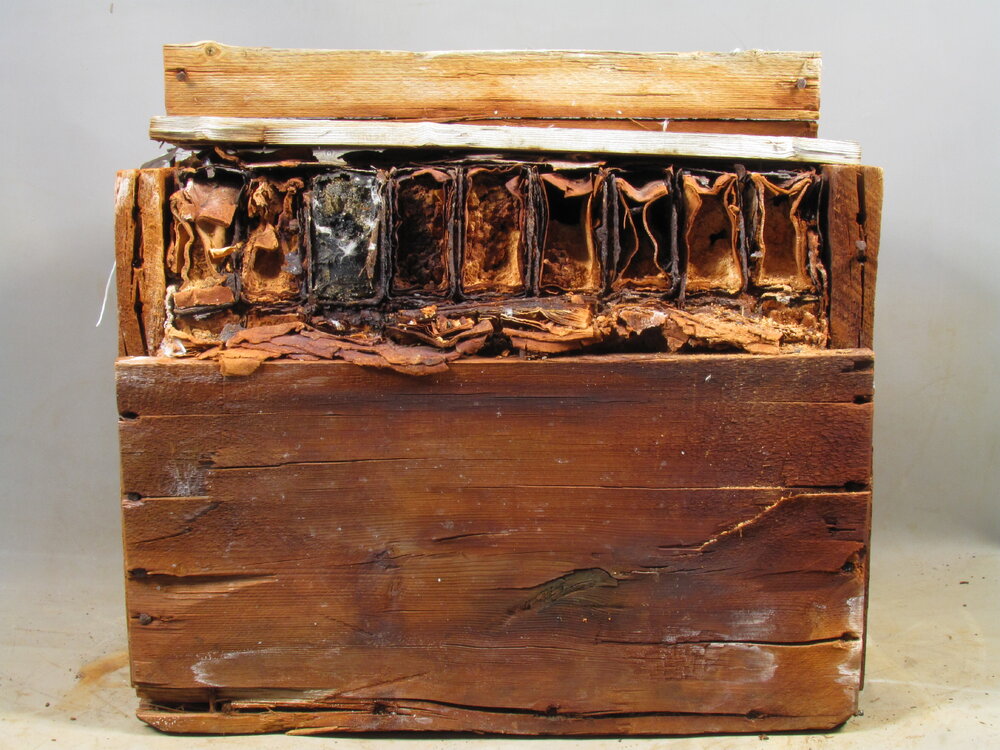 Box containing baking powder tins (001)