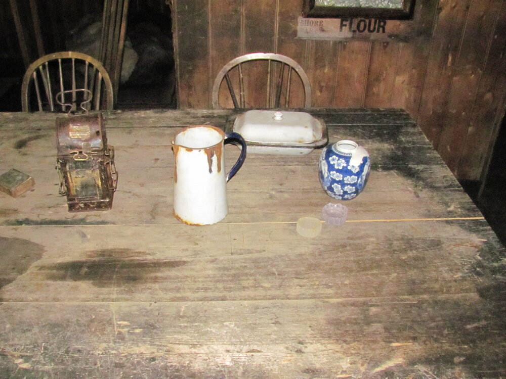2010-11 Artefacts on the Wardroom table inside Scott's 'Terra Nova' hut (004)