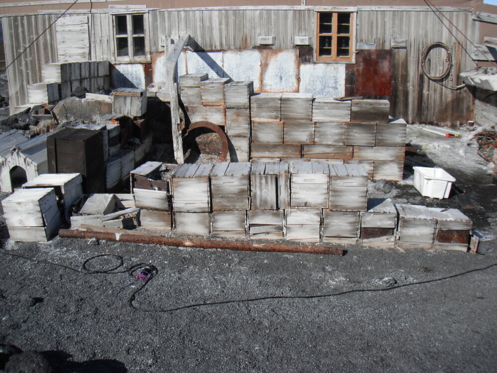2010-11 Boxes stacked around the Garage area, Cape Royds (001)