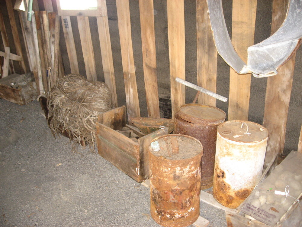 2010-11 Artefacts along the Annexe wall, Scott's 'Terra Nova' hut, Cape Evans (002)