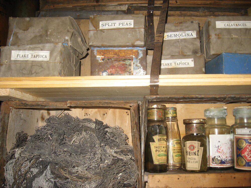 2010-11 Provisions on shelves inside Shackleton's 'Nimrod' hut