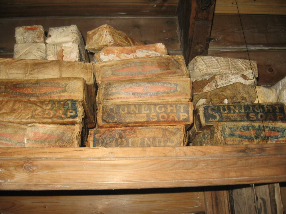 2010-11 Stack of Sunlight soaps inside Shackleton's 'Nimrod' hut, Cape Royds