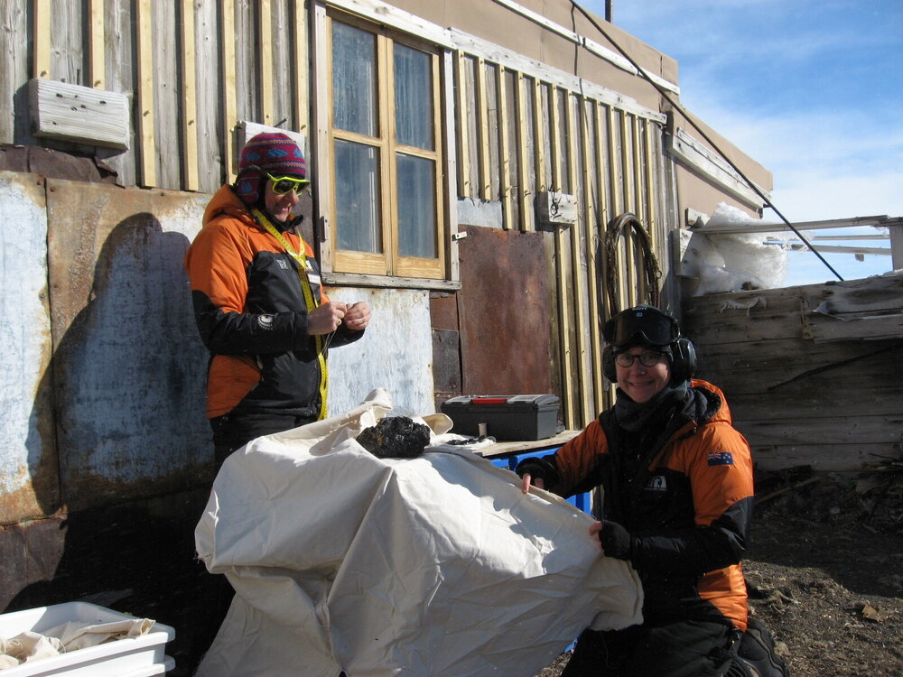 2010-11 Diana Komejan and Cricket Harbeck recovering fodder bales, Cape Royds
