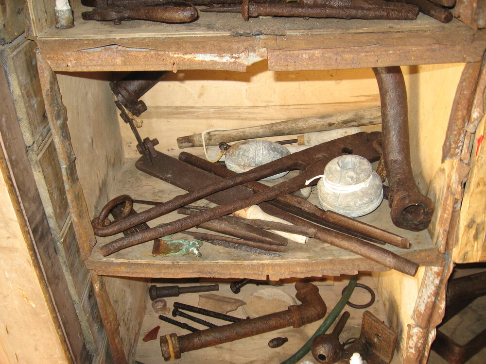 2010-11 Metal tools in the cold porch of Shackleton's 'Nimrod' hut