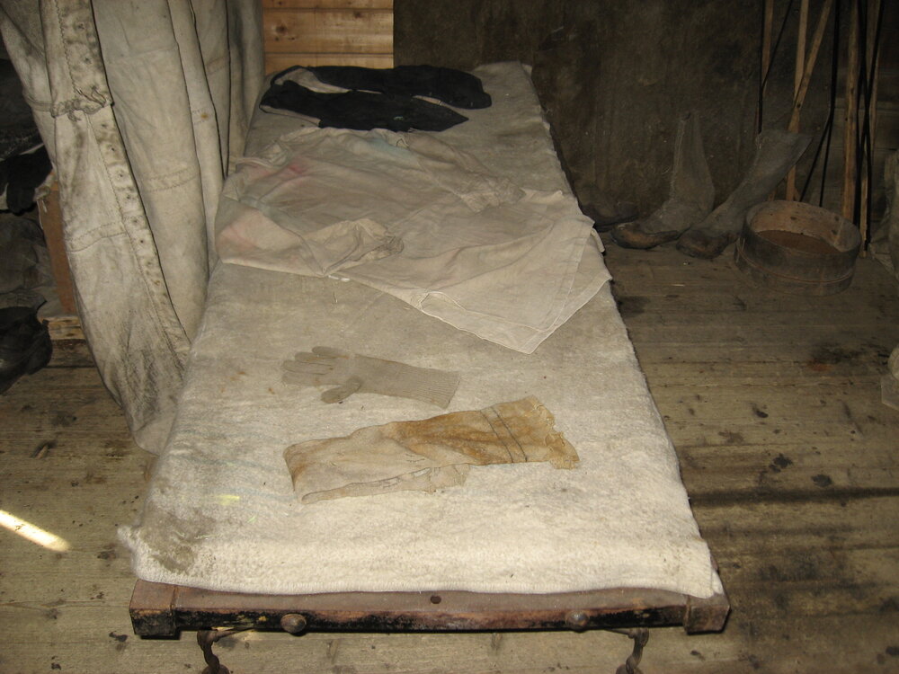 2010-11 Garments on a bunk inside Shackleton's 'Nimrod' hut, Cape Royds