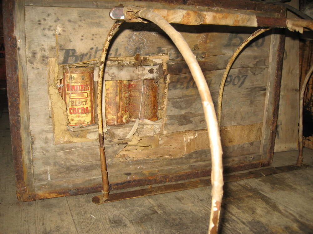 2010-11 Rowntree's Cocoa tins and Brocklehurst's leg protector, Cape Royds