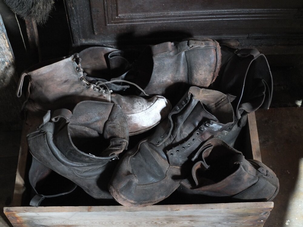 2014 Shackleton's 'Nimrod' hut interior, leather boots in crate