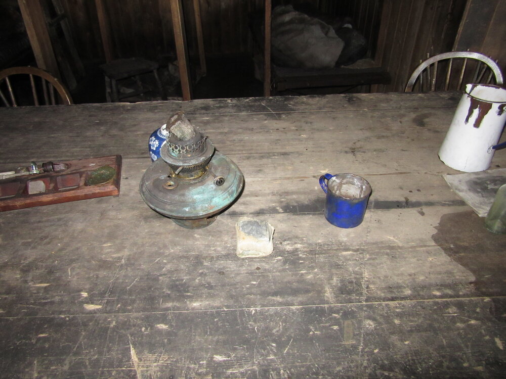 2015-16 Artefacts on Wardroom table, Scott's 'Terra Nova' hut (001)