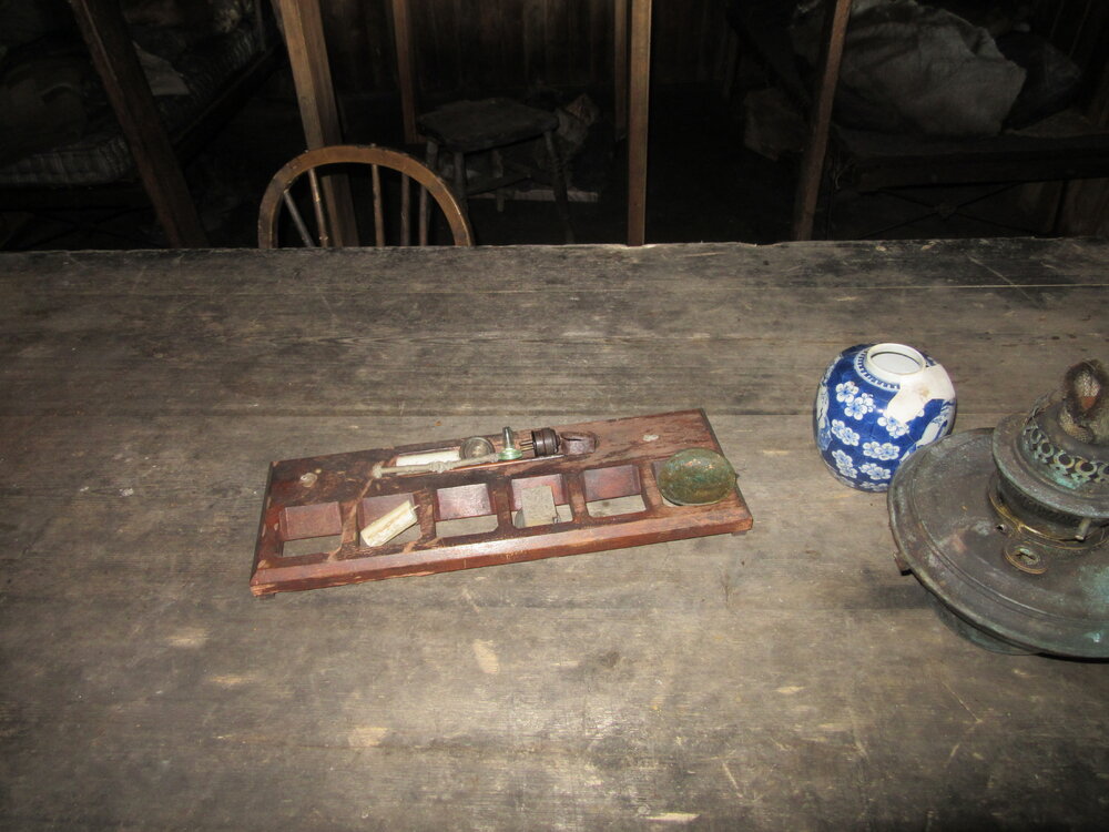 2015-16 Artefacts on Wardroom table, Scott's 'Terra Nova' hut (002)