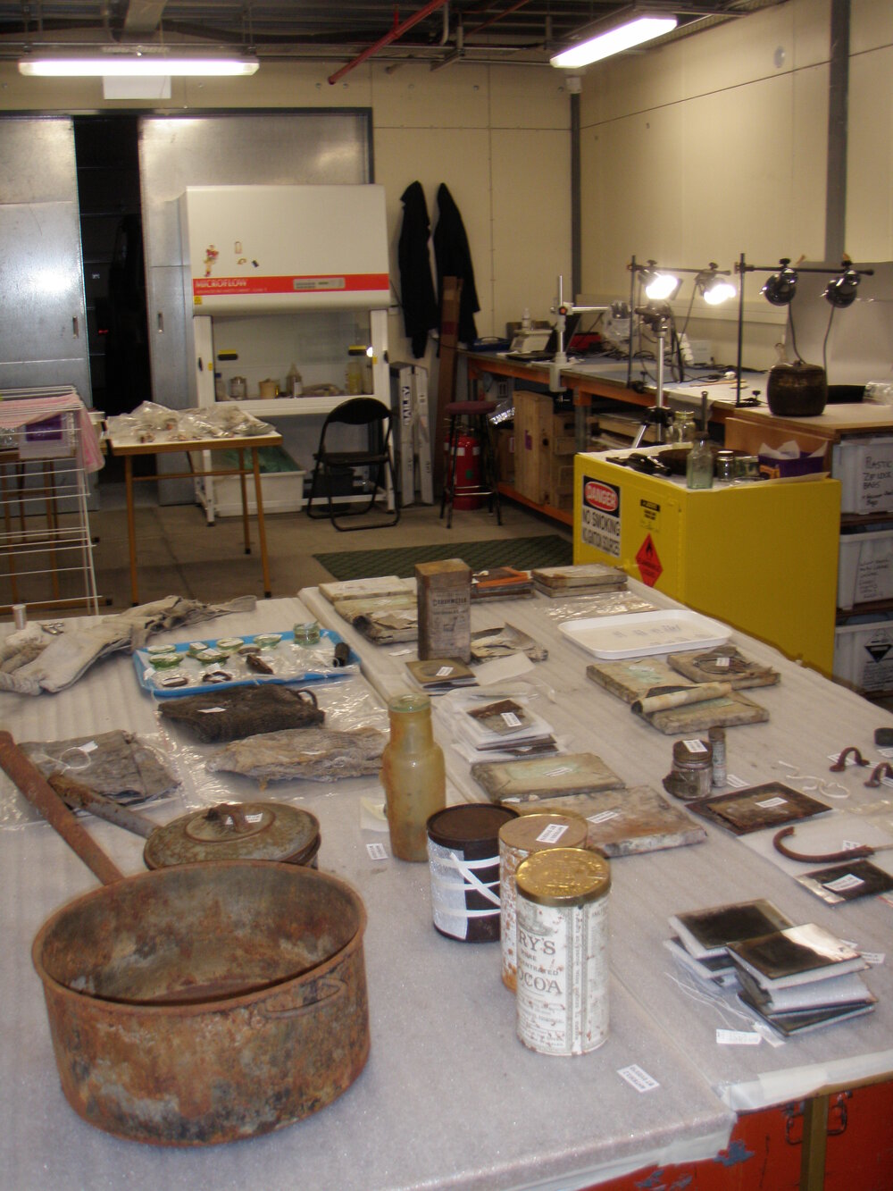 Artefacts on table in Conservation lab (003)