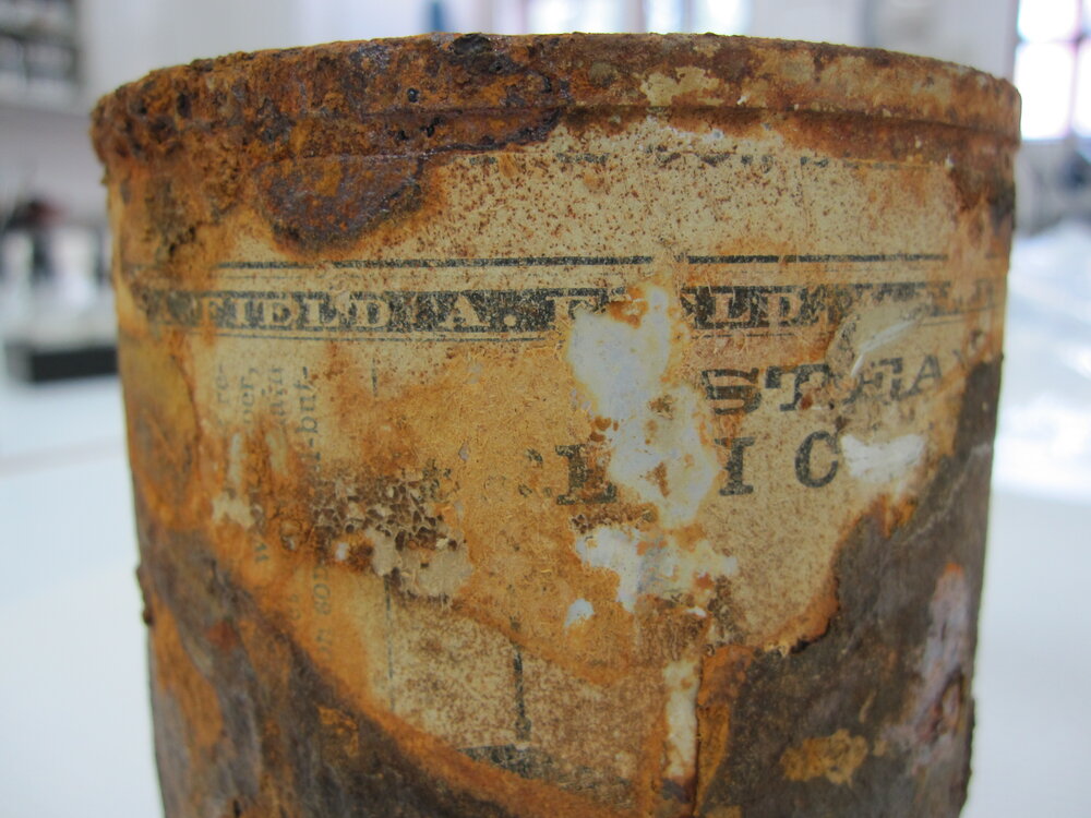 Tin and Label detail, before treatment