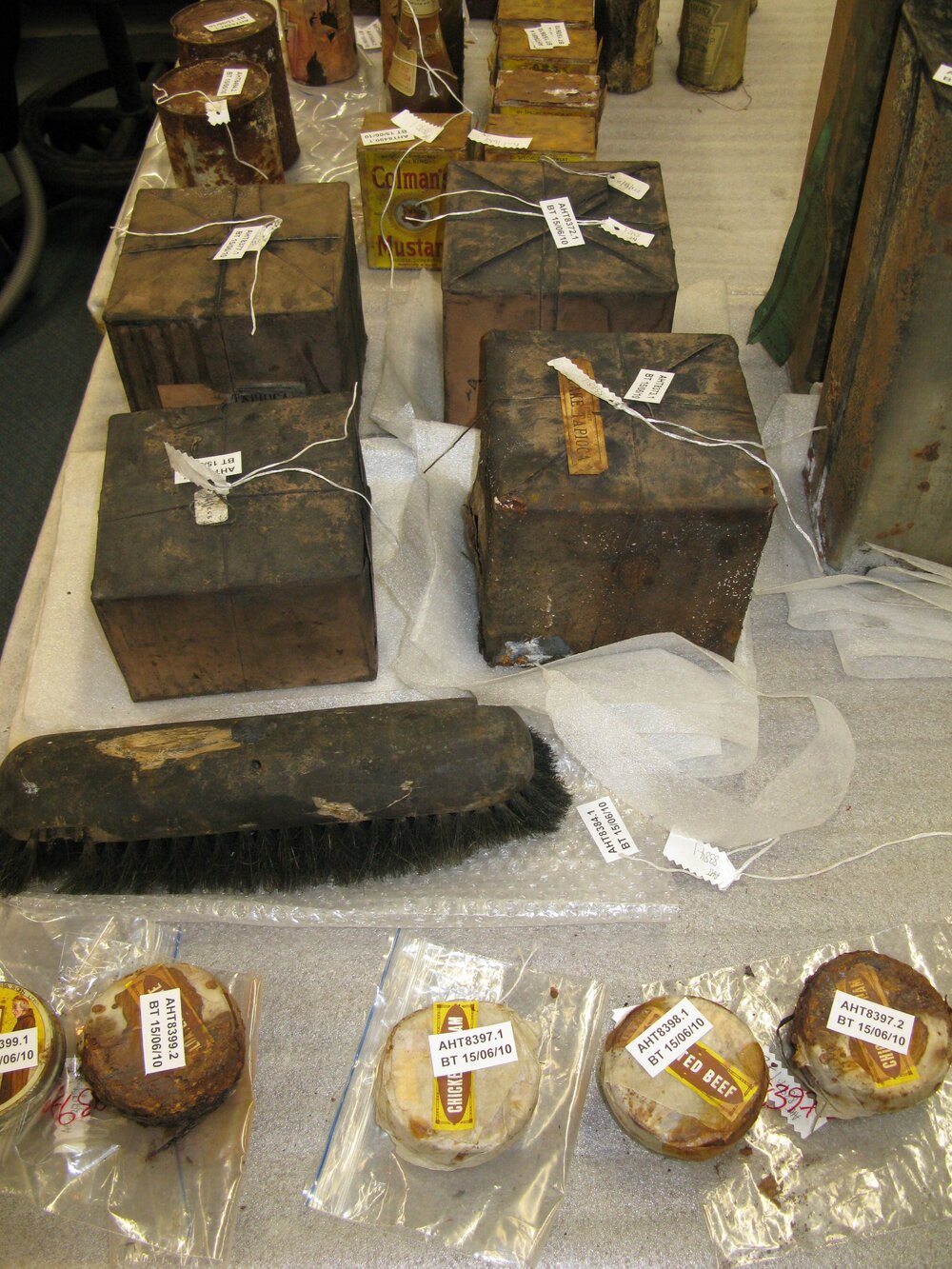 Artefacts on table in Conservation lab (003)