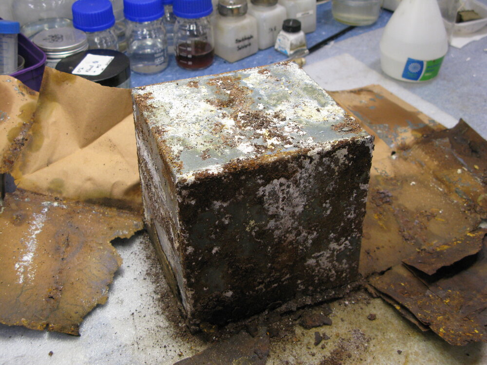 Griffiths McAllister tin and wrapper before treatment