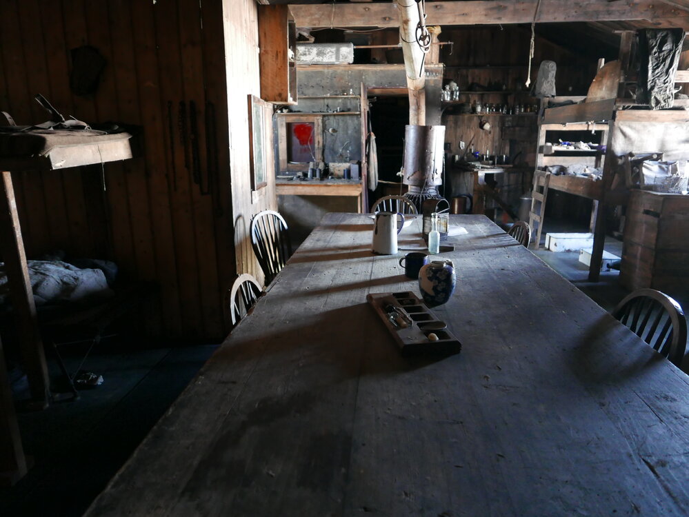 2018-19 Wardroom table inside Scott's 'Terra Nova' hut, Cape Evans
