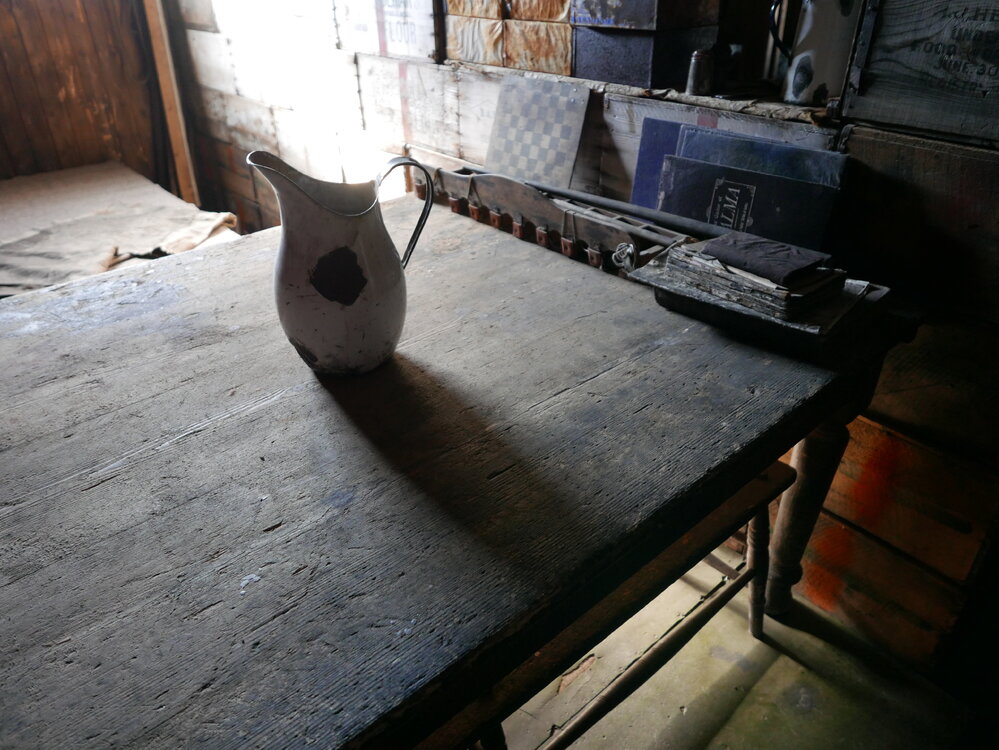 2018-19 Mess Deck table inside Scott's 'Terra Nova' hut, Cape Evans