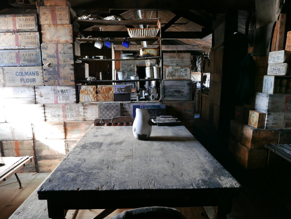 2018-19 Mess Deck table inside Scott's 'Terra Nova' hut, Cape Evans