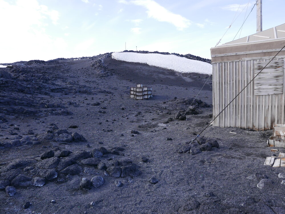 2018-19 Venesta cases stacked outside Shackleton's 'Nimrod' hut, Cape Royds
