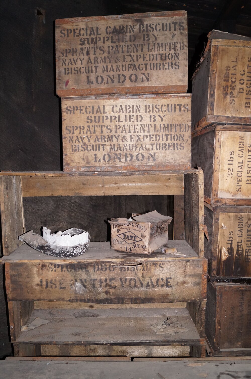 Improvised shelves and biscuit boxes