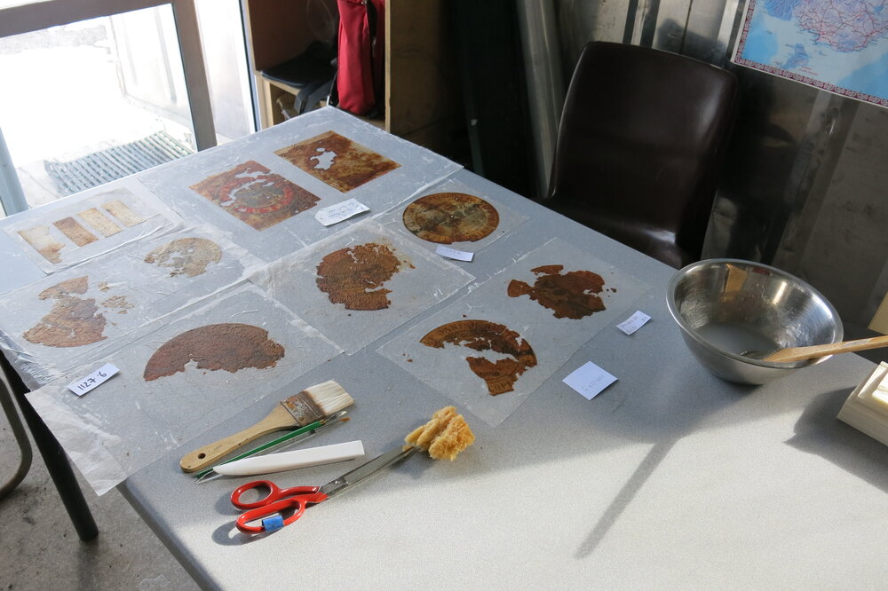 2013-14 Paper artefacts being conserved in the field camp, Cape Evans (001)