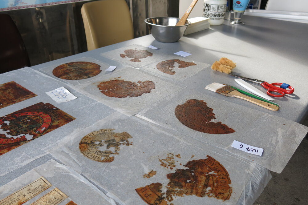 2013-14 Paper artefacts being conserved in the field camp, Cape Evans (004)