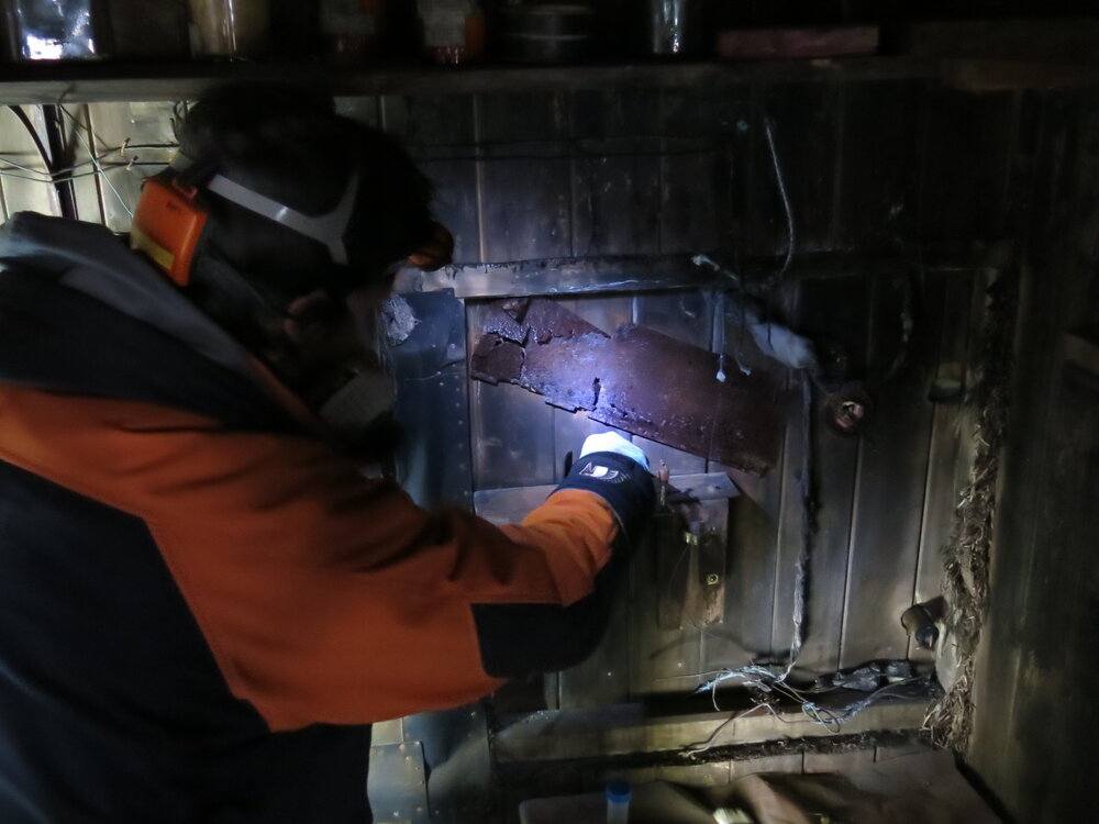 2013-14 Josiah Wagener treating fixtures inside Scott's 'Terra Nova' hut, Cape Evans