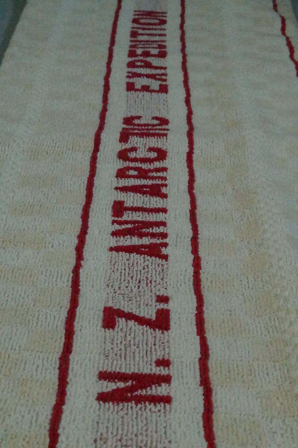 2013-14 TAE expedition towel inside Hillary's TAE/IGY hut, Pram Point