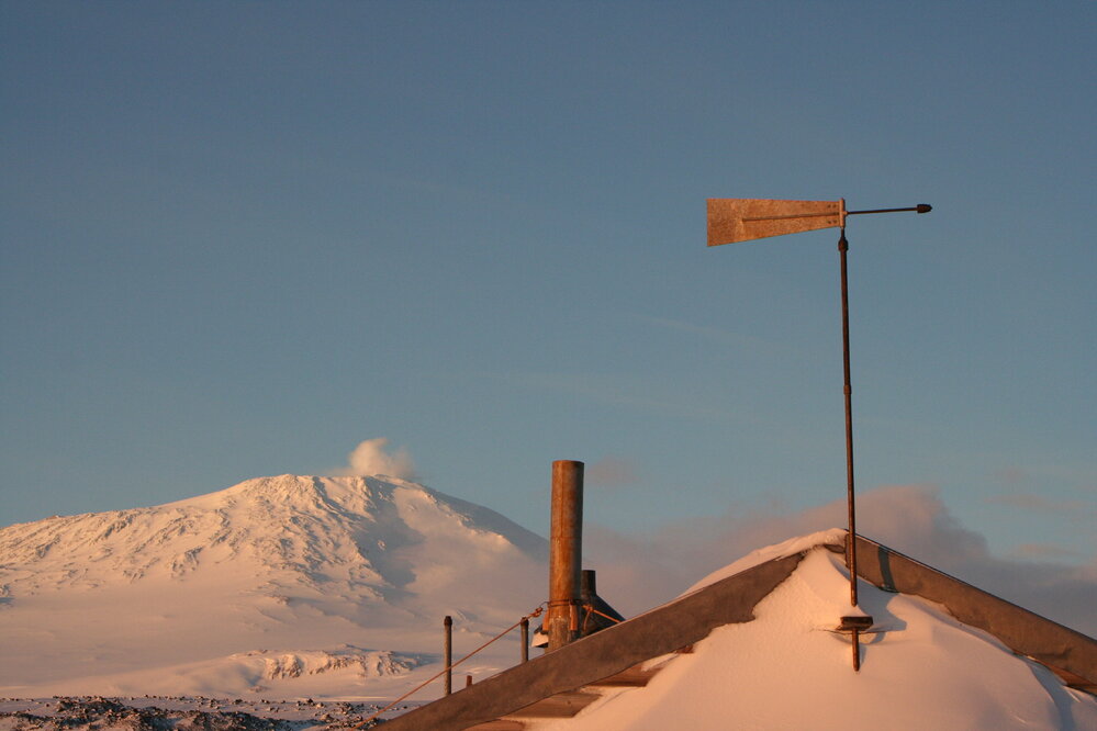 Wind vane on Scott's 'Terra Nova' hut and Mount Erebus