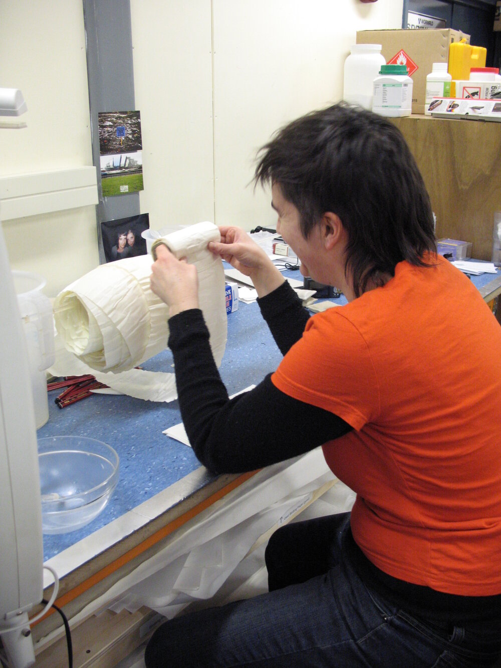 AHT Conservator Lizzie Meek treating chart paper roll