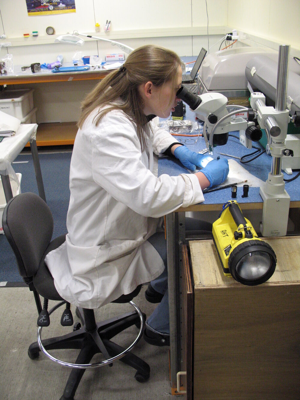 AHT Conservator Susanne Grieve inspecting artefact