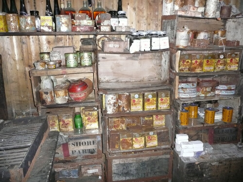 Venesta case shelving stocked with artefacts in galley, Scott's 'Terra Nova' Hut