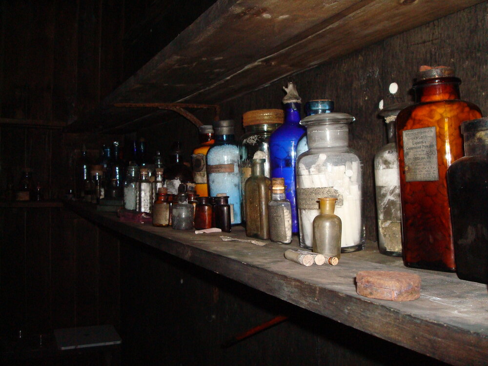 Medicines on shelf in Wilson and Evans corner, Scott's 'Terra Nova' Hut 