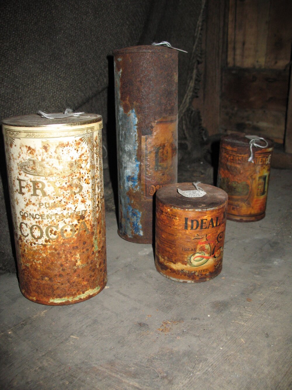 Corroded tins of food with coating applied, Scott's 'Discovery' Hut
