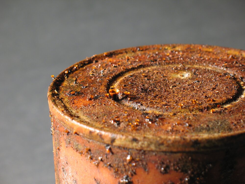 Corroded tin lid (001)