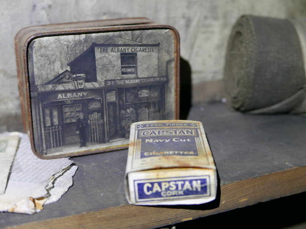 2017-18 Scott's 'Terra Nova' hut, interior, cigarette tin and packet