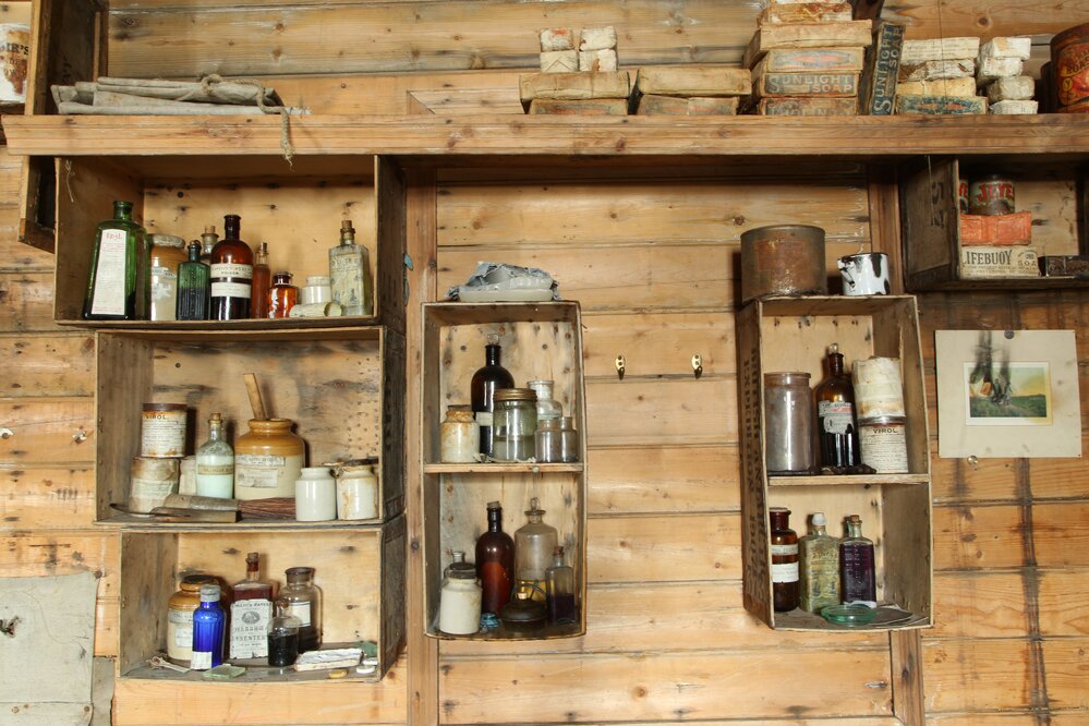 2017-18 Shackleton's 'Nimrod' hut, interior, artefacts in shelving
