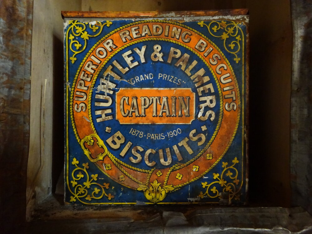2017-18 Shackleton's 'Nimrod' hut, interior, Huntley &amp; Palmers biscuit tin