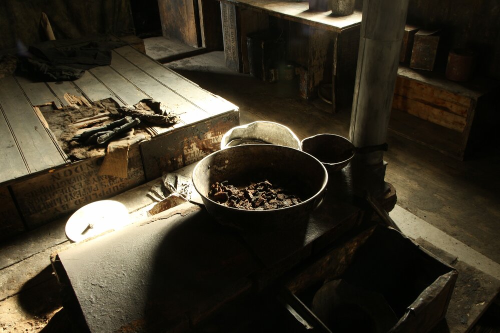 2017-18 Scott's 'Discovery' hut, interior, blubber stove and sleeping platform