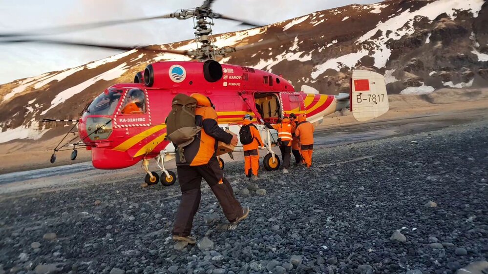 2017-18 Loading into CHINARE helicopter at Cape Adare